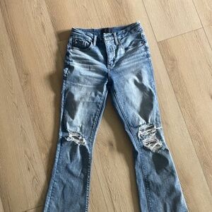 Buckle Black mid rise jeans
